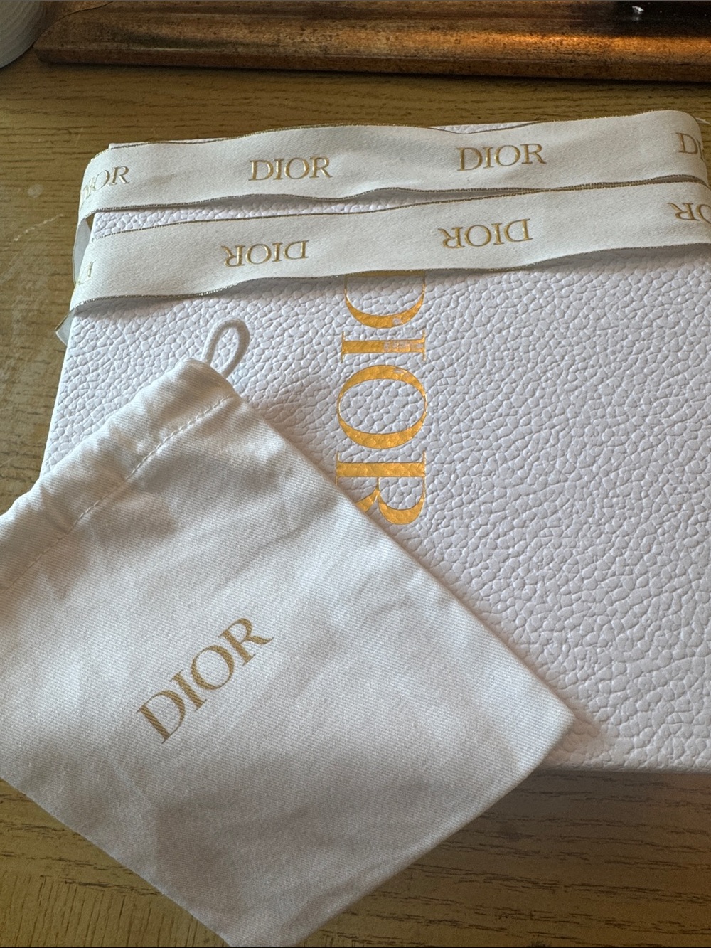 Dior White box  ribbon and drawstring bag all with the gold logo